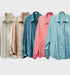 Collection of button-up shirts in various colors, embellished with natural gemstones, showcasing style and elegance.